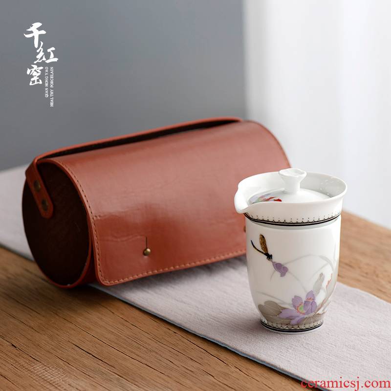 Travel tea set suit portable bag simple hand - made ceramic tea cup kung fu tea set to crack a pot of three