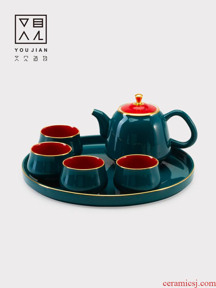 Set a pot of four cups of ceramic teapot household small sets of portable office tea, Chinese kung fu tea cups