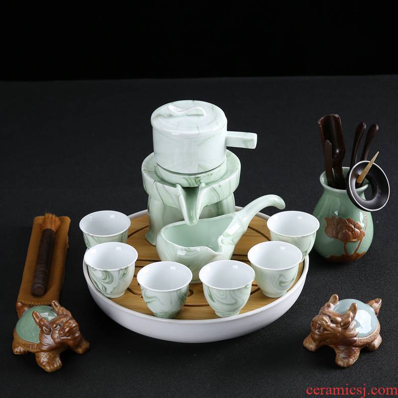 Tea set home stone mill creative ceramic teapot Tea tray was kung fu Tea cup half full automatic lazy