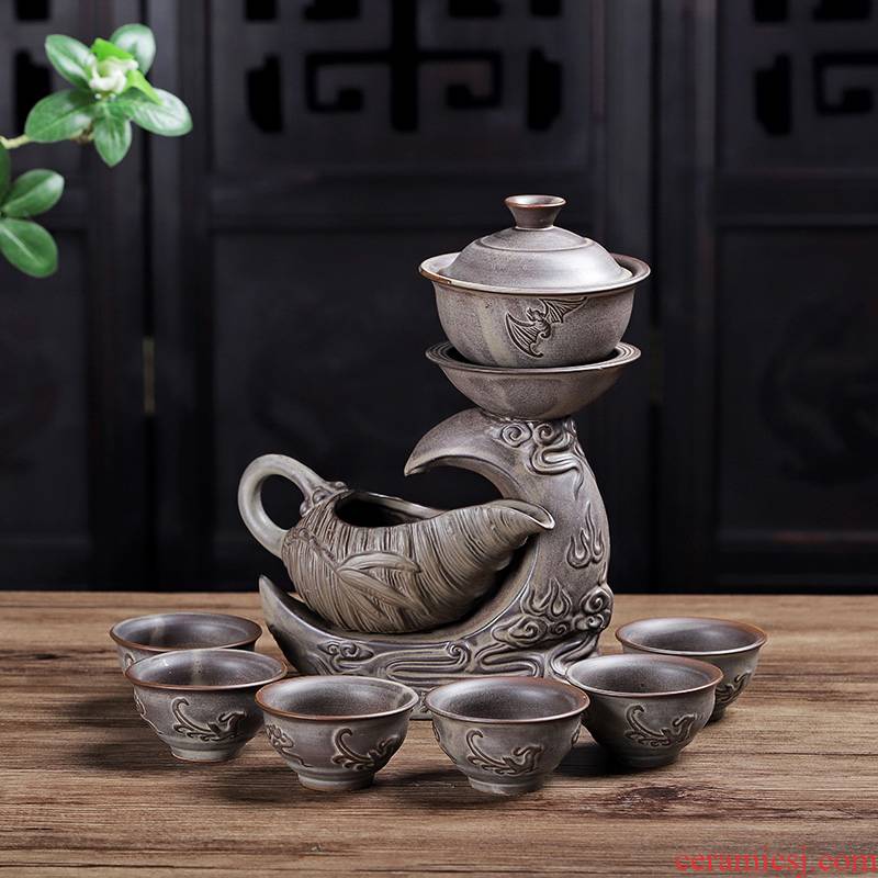 A complete set of kung fu tea set suit household contracted ceramic cups all semi - automatic creative tea modern lazy tea set