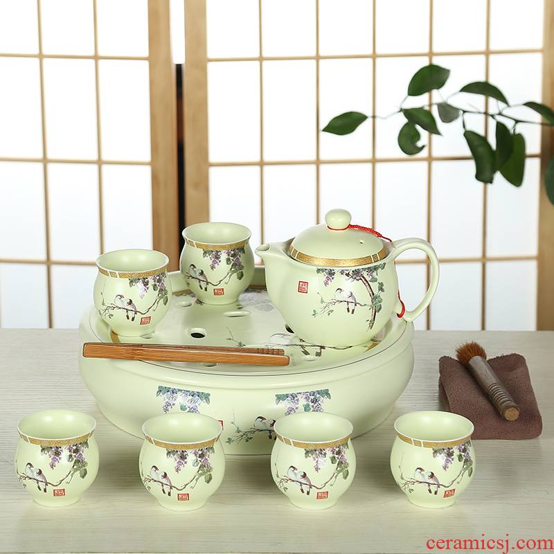 Friend is circular tray was kung fu tea set suit household gift box of a complete set of ceramic tea tray was double teapot teacup and heat insulation