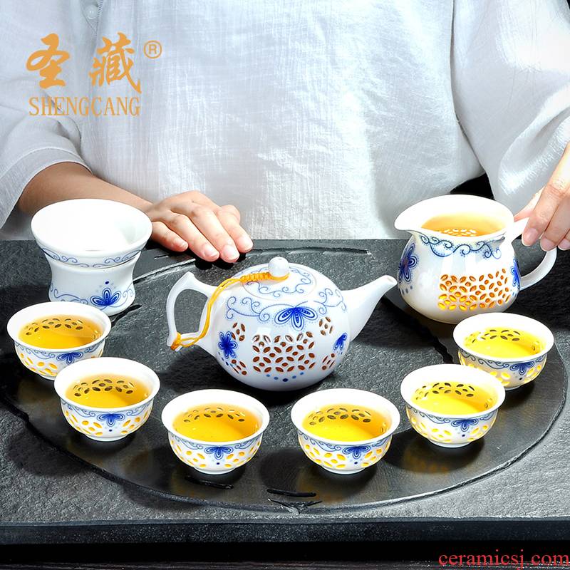 A complete set of exquisite time tea service suit hollow ceramic kung fu tea cup lid to use simple Chinese style is contracted with tea