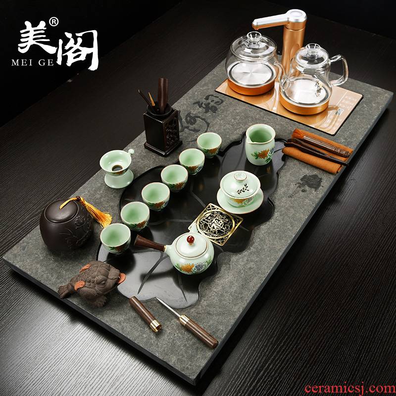 The cabinet sharply stone tea tray ceramic tea set a complete set of kung fu household automatic induction cooker tea tea taking