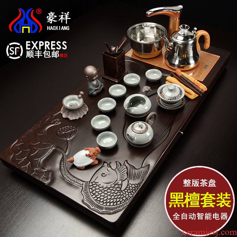 Howe auspicious ebony blocks the whole sets of kung fu tea tray was solid wood tea tea sets purple four one household tea sea