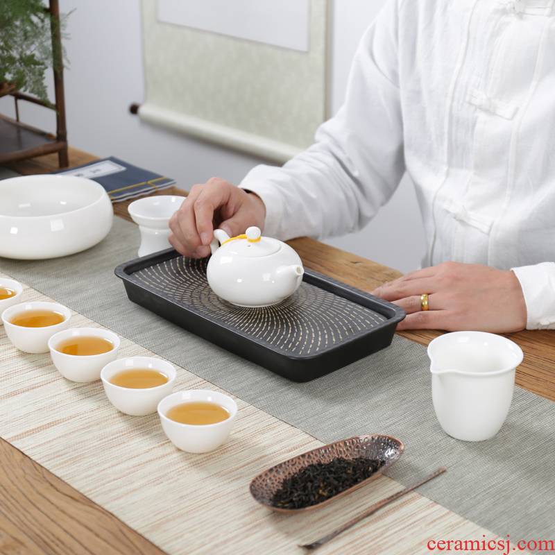 White porcelain kung fu tea set jade suit dehua porcelain teapot teacup of a complete set of ceramic filter tureen tea to wash to the home office