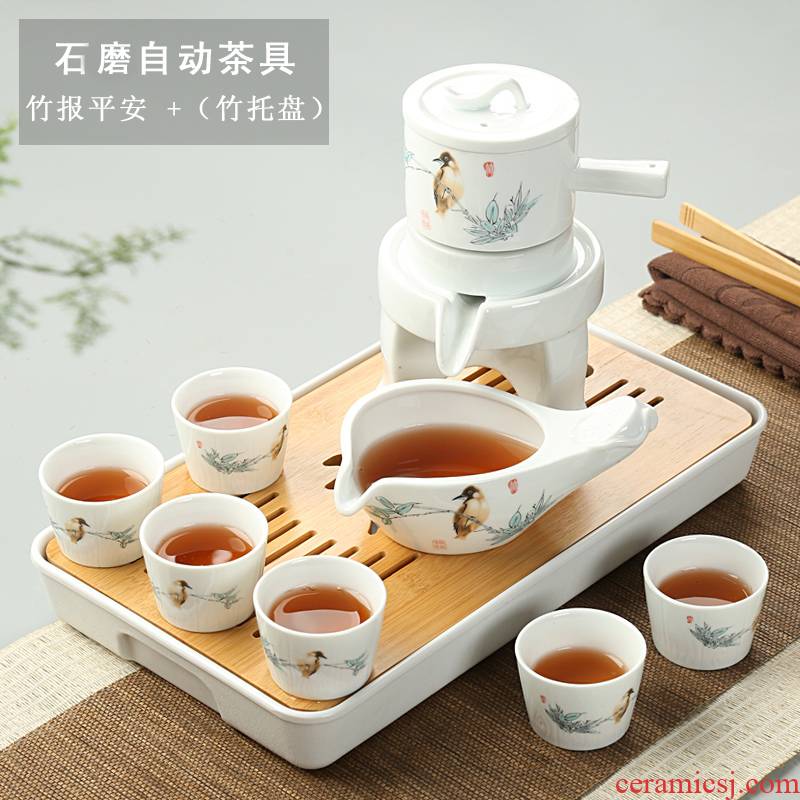 And a half stone mill automatic tea sets of household ceramics kung fu tea set creative lazy teapot hot tea. preventer