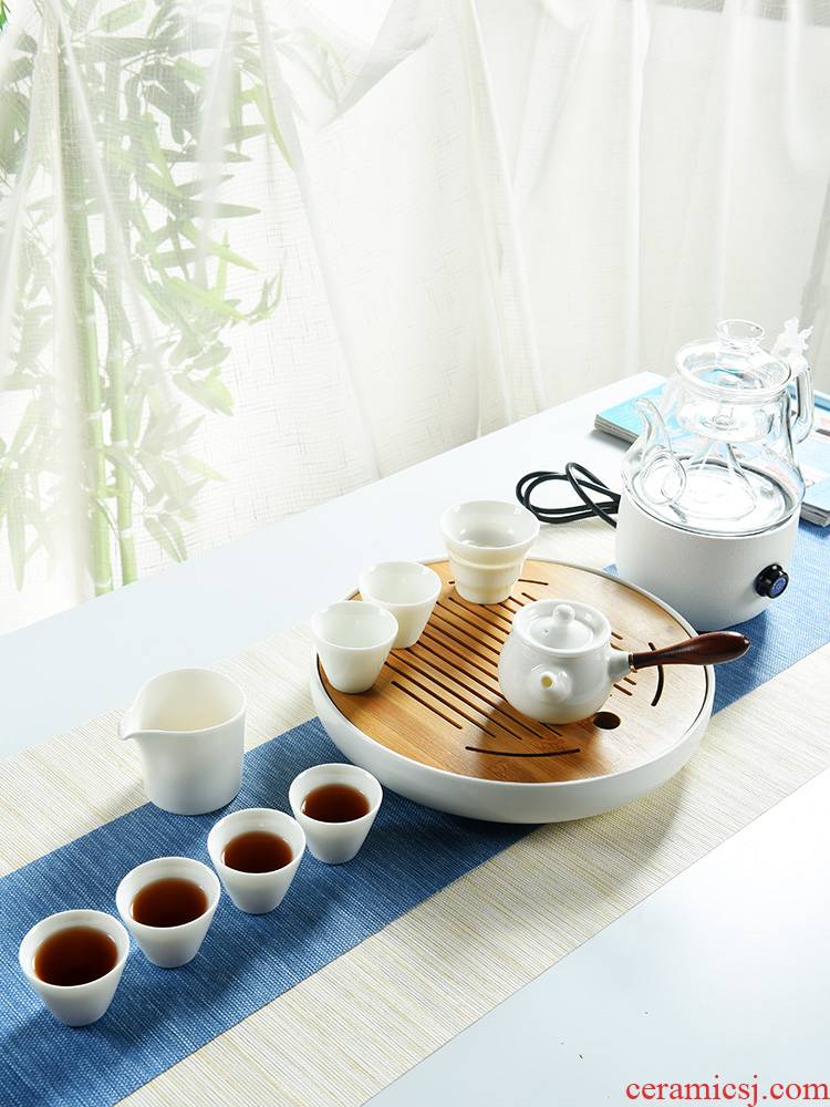 The cabinet dehua white porcelain kung fu tea set home office contracted dry tea plate glass ceramic electric TaoLu suits for