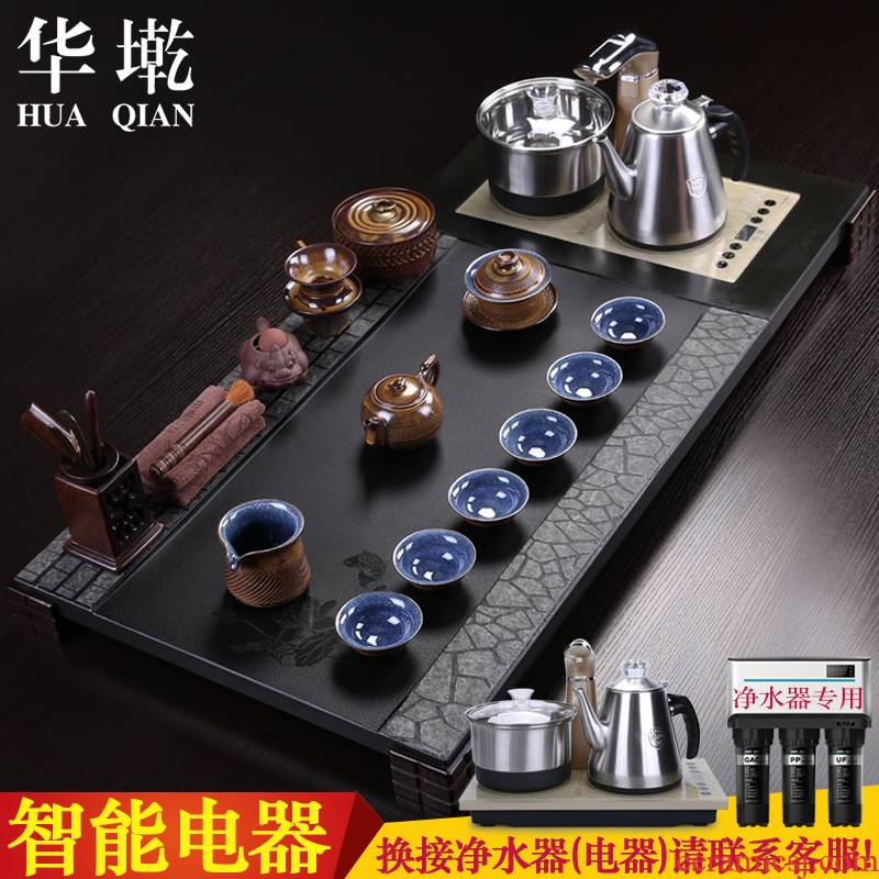 China Qian sharply stone kung fu tea set the whole grey or black gold stone tea tea table four unity of electric heating furnace