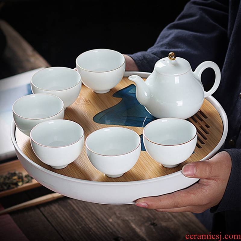 Really hold high white porcelain tea set household contracted teapot teacup water storage of a complete set of kung fu tea table dry terms plate
