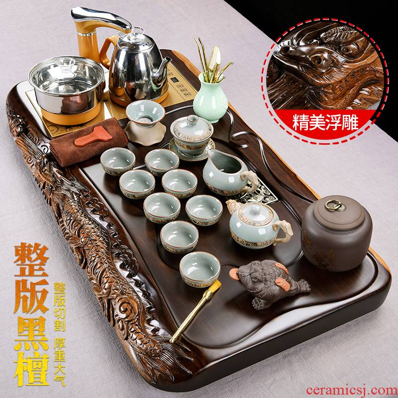 The pavilion side of ebony carved wood tea tray ceramic teapot automatic tea tea set household kung fu tea taking