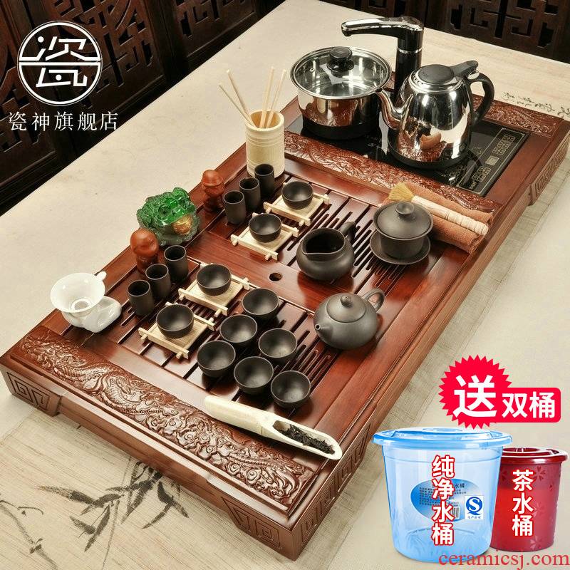 Kung fu tea set porcelain god set a complete set of tea cups of household solid wood tea tray tea sea magnetic electric furnace four unity