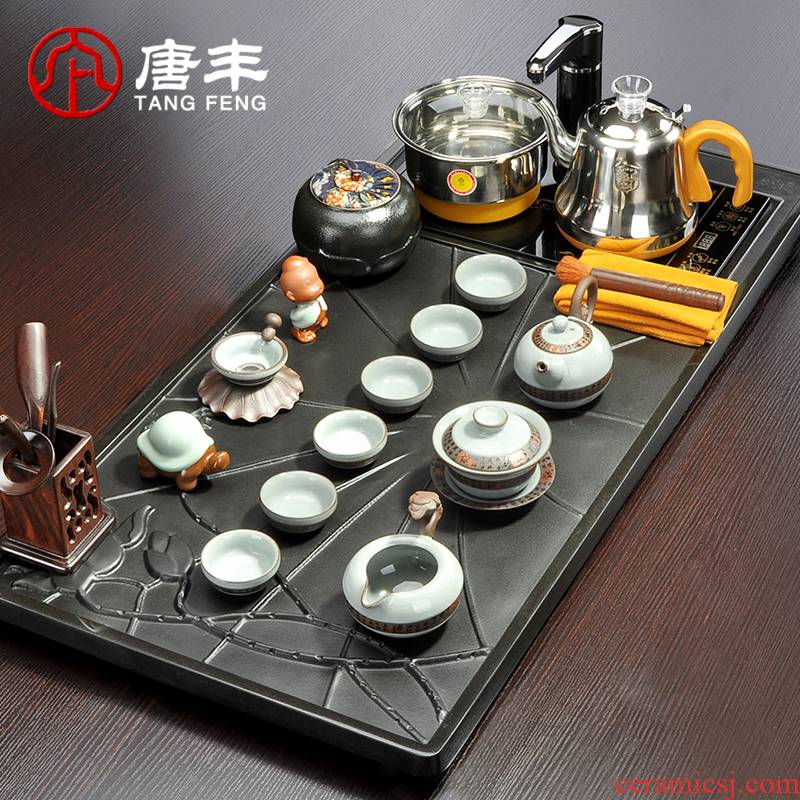 Tang Feng sharply stone tea set suits for domestic solid wood tea taking of a complete set of ceramic purple sand automatic four one of the big tea tray