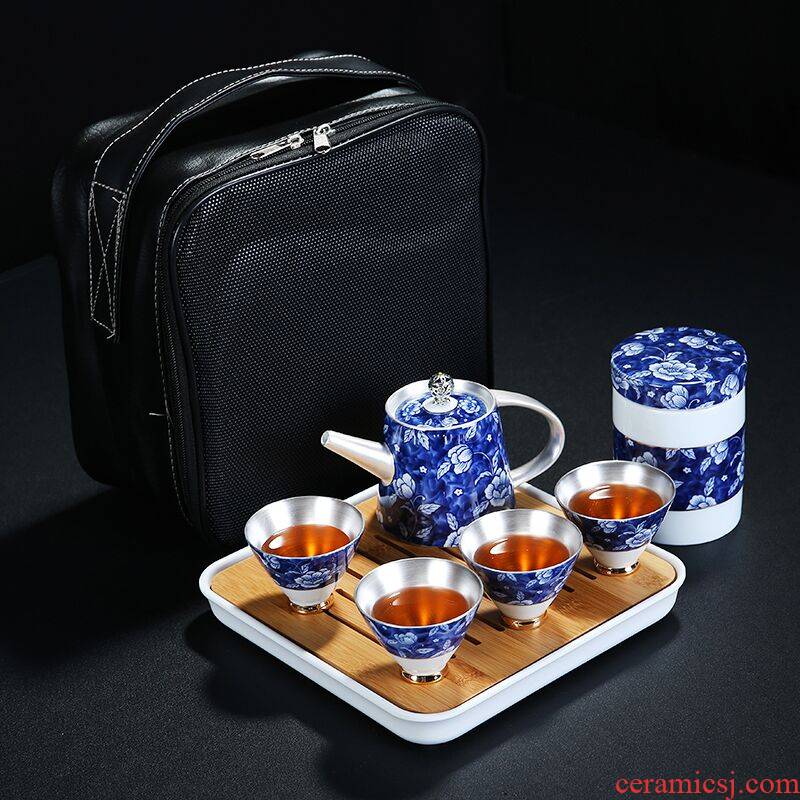 Travel kung fu tea set a pot of 4 cups of blue and white coppering. As silver teapot teacup is suing portable bag the whole household ceramics