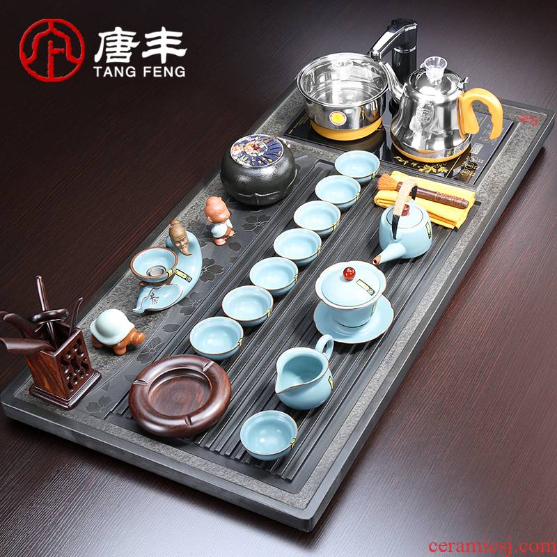 Tang Feng large black stone blocks sharply the electric heating furnace one stone tea tray was violet arenaceous stone tea tea set