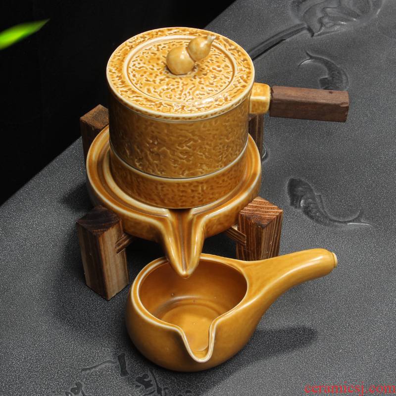 Semi automatic kung fu tea set stone mill creative move ceramic household lazy people make tea, the teapot teacup
