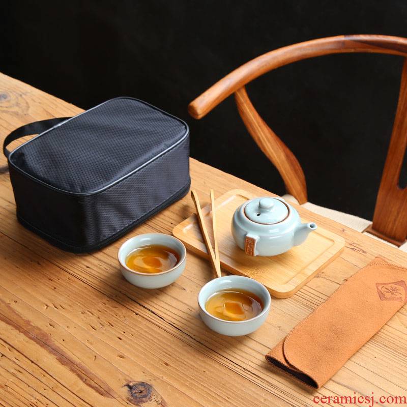 Travel tea set purple sand cup to crack a pot of two cups of portable package with kung fu tea cup trill the teapot