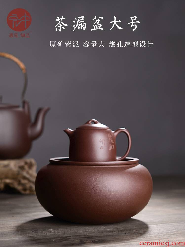 Macro new yixing purple clay by hand in the dross barrels of kung fu tea accessories, water, after the tea pot