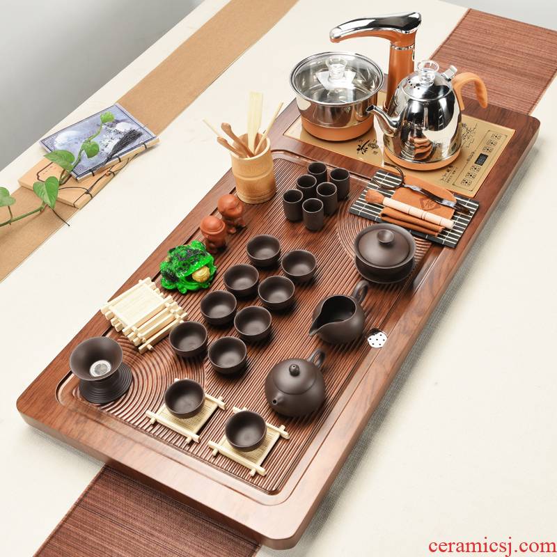 Violet arenaceous kung fu tea set solid wood tea tray of a complete set of household contracted suit electromagnetic heat furnace automatic four unity
