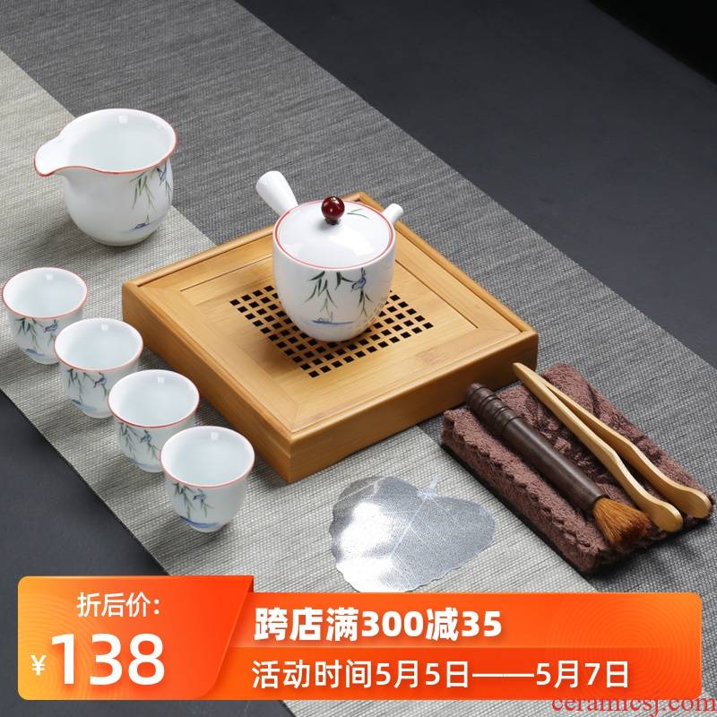 Ceramic hand - made tea sets travel four cups is suing household contracted white porcelain tea pot a pot of kung fu tea tray