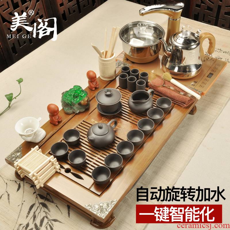 The cabinet of household ceramic teapot kung fu tea set solid wood tea tray tea tea table automatic electric magnetic furnace