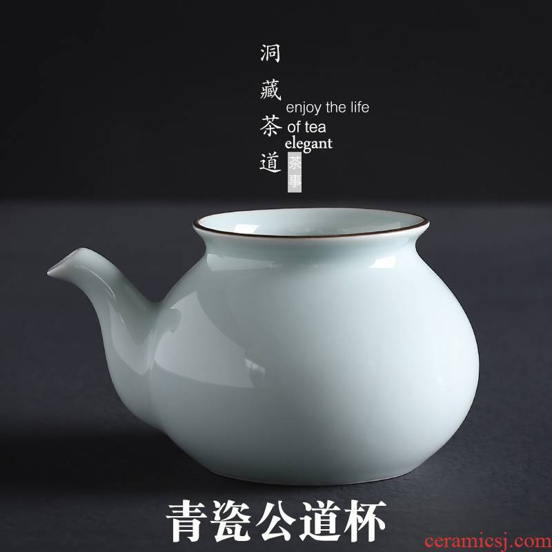 In building shadow green celadon large portion narrow justice cup tea ware ceramic tea sea kung fu tea and a cup of tea