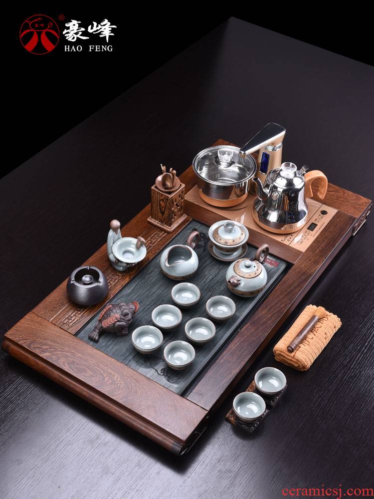 HaoFeng kung fu tea set home tea cups contracted chicken wings wood tea tray of a complete set of automatic electric furnace