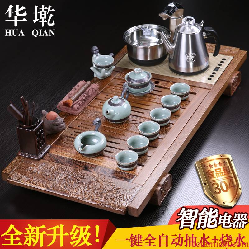 China Qian tea set chicken wings wood four unity induction cooker yixing purple sand tea tray was kung fu tea set automatic stone mill