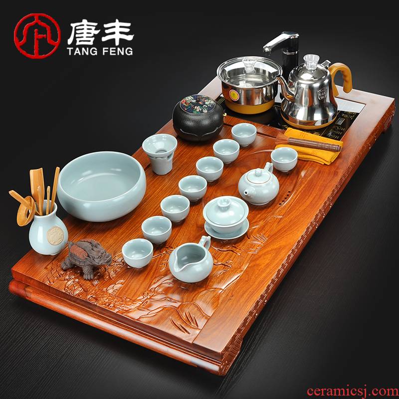 Tang Feng annatto spend pear wood, ceramic kung fu tea sets tea tray was four one tea table of a complete set of electric heating furnace