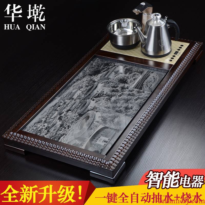 China Qian kung fu tea natural ebony wood tea tray was sharply stone large tea saucer sea four unity induction cooker