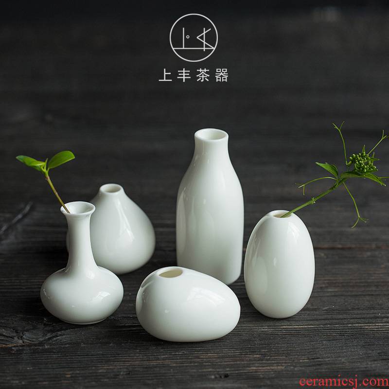 On the an abundant tea suet jade porcelain flowers, fresh white porcelain bottle home furnishing articles creative Chinese zen retro flower receptacle
