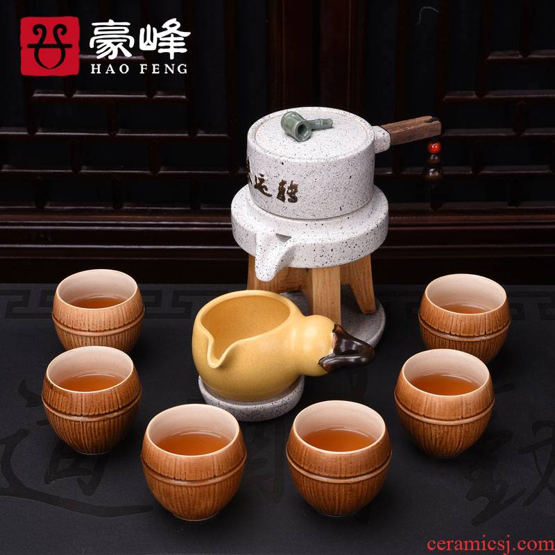 HaoFeng creative lazy stoneware kung fu tea set stone mill automatically restore ancient ways of a complete set of Japanese teapot cup suit