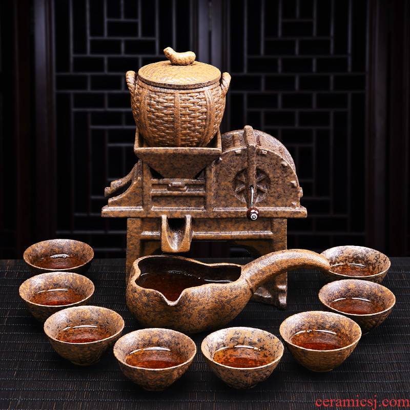 A complete set of creative lazy automatic ceramic kung fu tea set, the household of Chinese style restoring ancient ways millstones teapot cup suits for