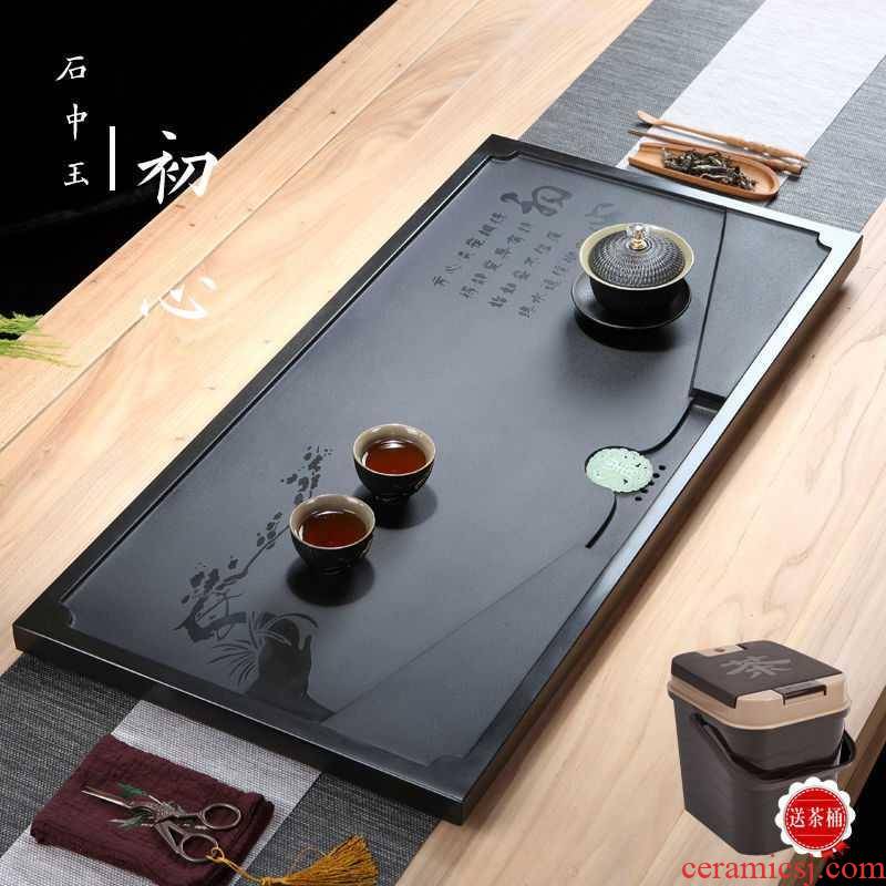 Chinese high - grade stone tea tray was sharply home natural block stone is black stone tea sets of kung fu tea set office