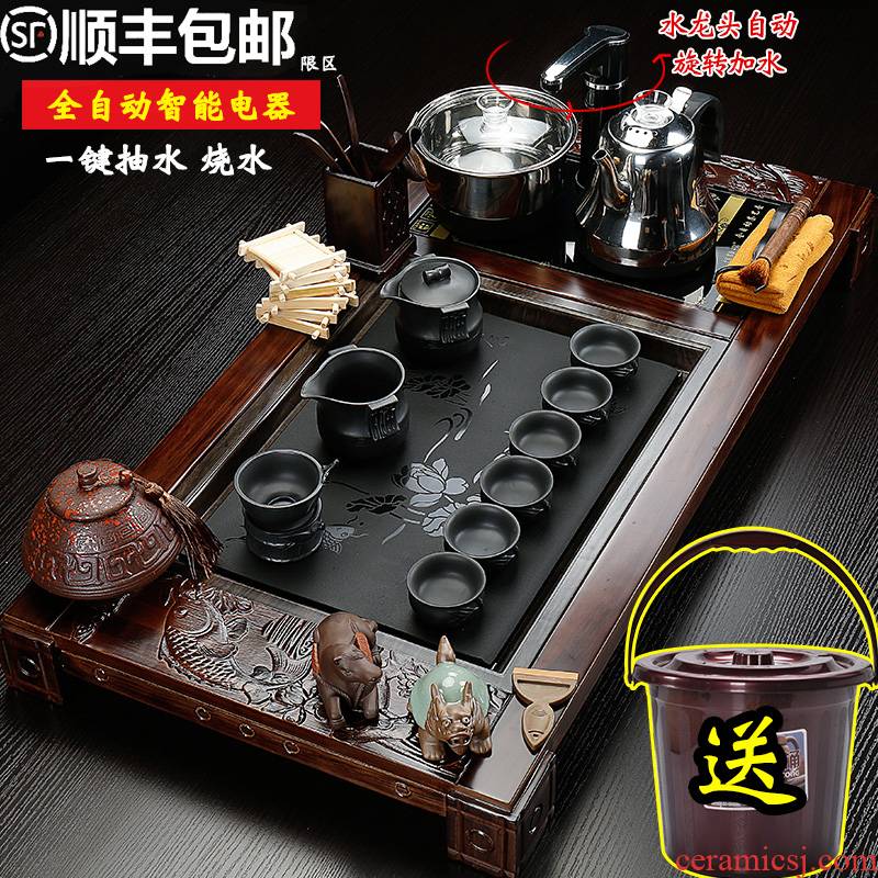 The sea make electric joining together of four solid wood automatic tea tray was purple sand tea set ceramic whole household kung fu tea taking