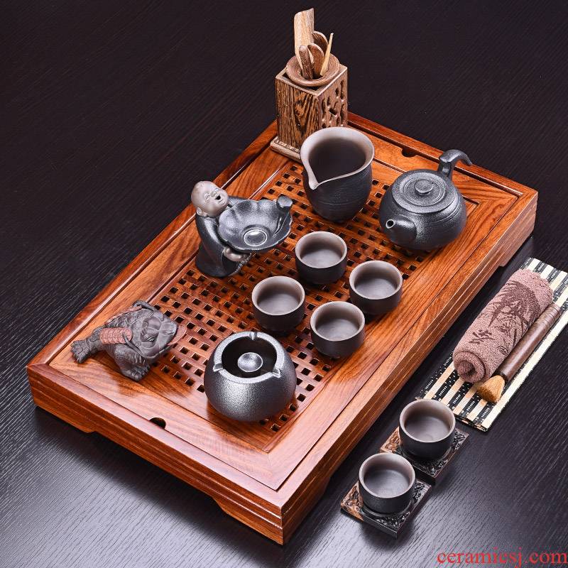 A complete set of kung fu tea set purple sand pottery and porcelain tea sets hua limu tea sets tea tea tray was solid wood tray