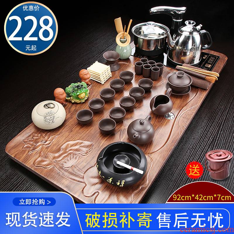 Automatic kung fu tea set with violet arenaceous contracted solid wood tea tray, making tea cups of a complete set of the tea taking
