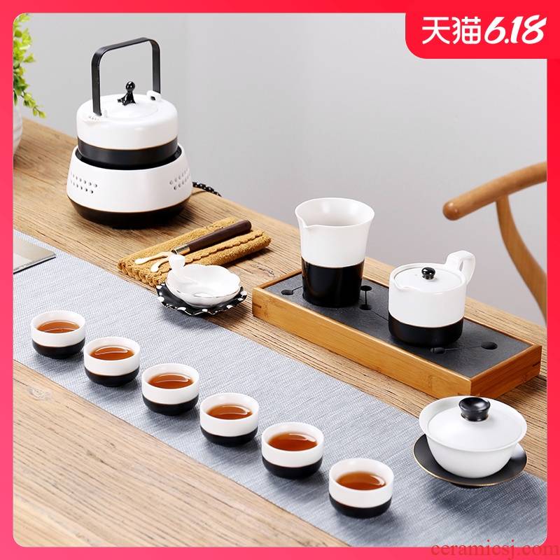 Sand embellish pottery sides kung fu tea set simple black and white porcelain paint TaoLu ceramic teapot teacup of a complete set of electricity