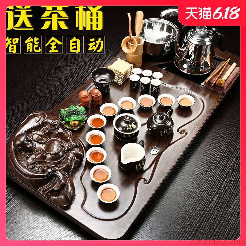 Sand embellish tea set suit household contracted automatic violet arenaceous kung fu of a complete set of the joining together of four solid wood tea tray, tea tea taking