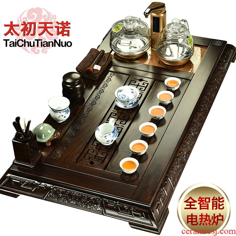 The beginning day, a complete set of tea sets ebony tea tray and four electromagnetic heat furnace glass pot of purple sand tea set
