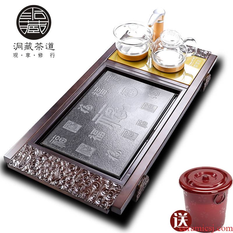 In building a complete set of solid wood tea tray automatic kung fu tea set household water induction cooker tea sea