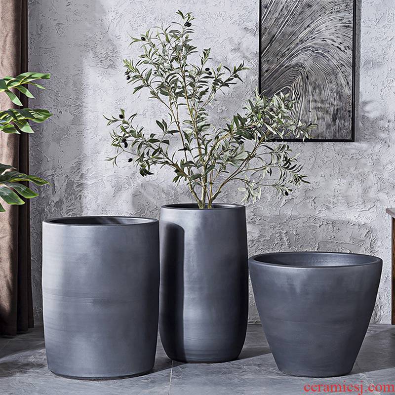 Black ceramic vase hydroponic water lily basin tank cylinder flowerpot planting large courtyard green plant in northern Europe interior decoration