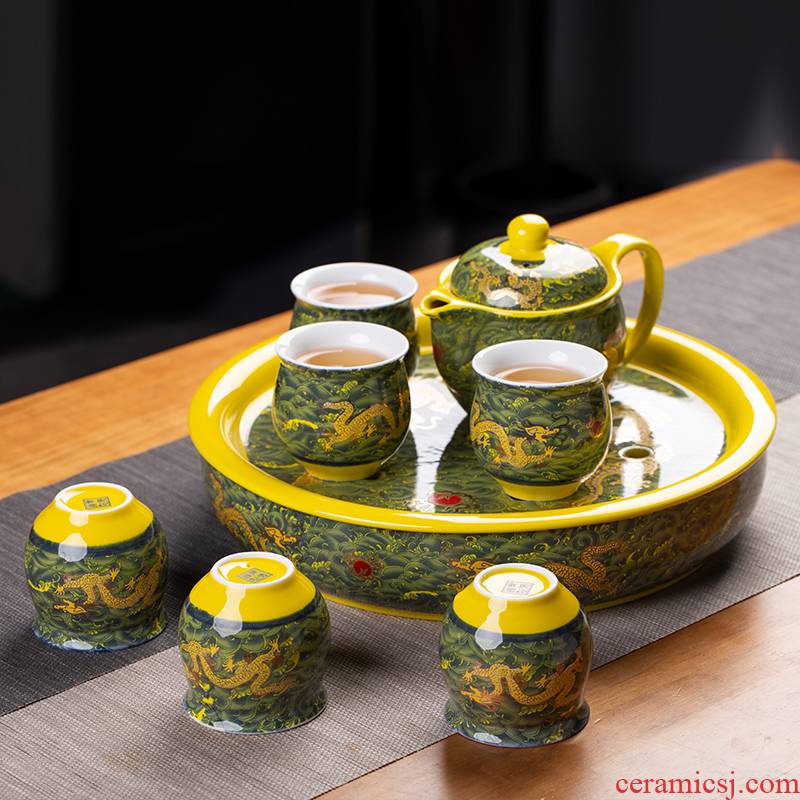 Jingdezhen ceramic tea set suit household of Chinese style kung fu tea taking round a cup of tea with tea tray cups of a complete set of the teapot