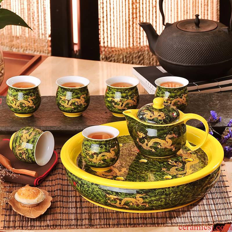 Jingdezhen ceramic tea set suit household of Chinese style kung fu tea taking round a cup of tea with tea tray cups of a complete set of the teapot