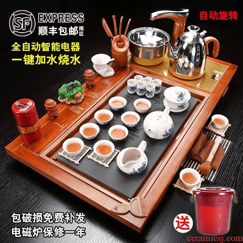 The kitchen utensils suit household kung fu tea set solid wood tea tray automatic induction cooker ceramic glass cup