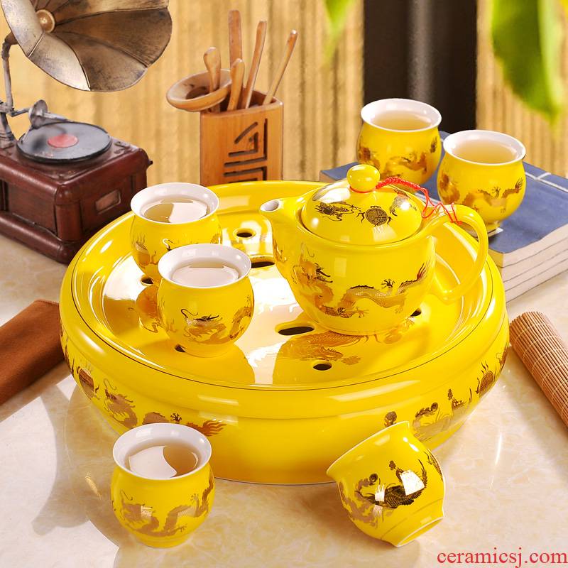 Jingdezhen ceramic tea set home round yellow longfeng kung fu tea tea tea tray was a complete set of the teapot