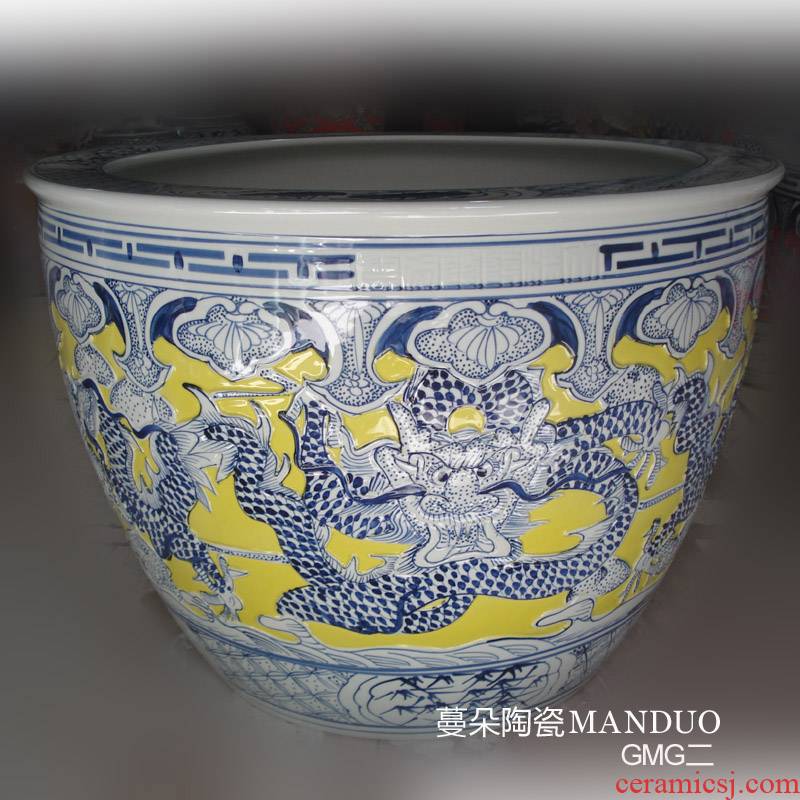 Jingdezhen yellow bottom emboss dragon China cylinder diameter 50-70 wulong China painting and calligraphy in yellow dragon cylinder