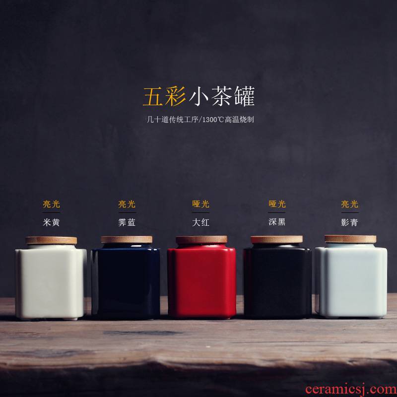 The ceramic tea canister mini jar airtight pu 'er tea pot black Chinese wolfberry powder pot small portable storage tanks