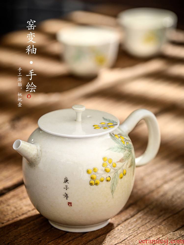 Jingdezhen tea pot pot of pure manual hand - made loquat kunfu tea ball hole ceramic small pot of creative Chinese thin body