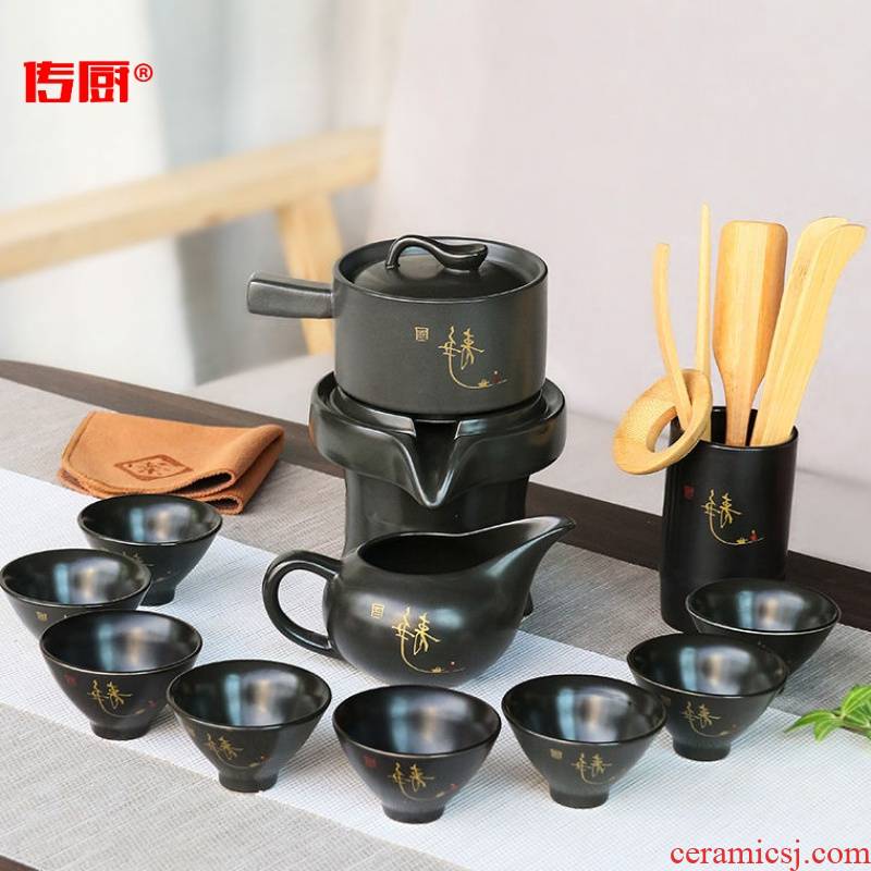 The kitchen household ceramic teapot rotating out of The water of a complete set of lazy semi - automatic purple sand tea set suit creative kung fu