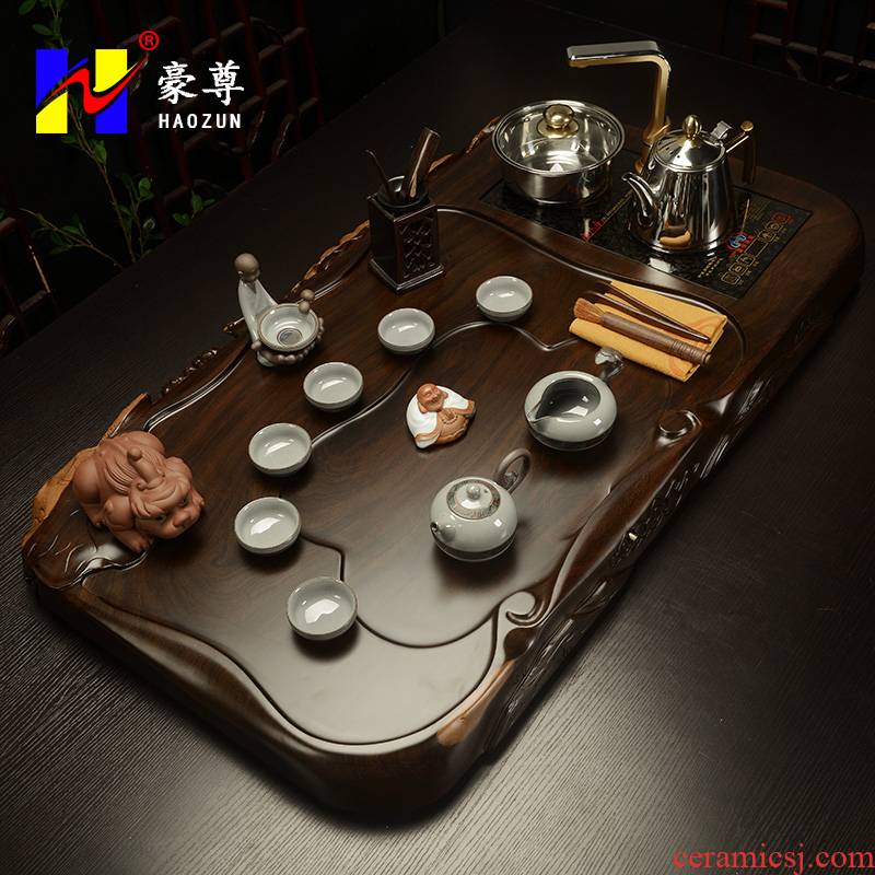 Shadow enjoy a complete set of ebony wood tea tray was kung fu tea sets purple elder brother up four unity induction cooker tea HZ
